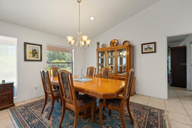 13719 Seminole Trl, Wimauma, FL 33598 - dining room with a chandelier, light tile patterned floors, and lofted ceiling