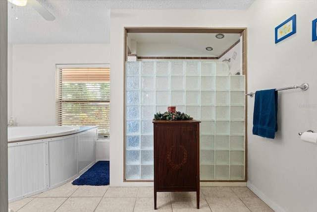 13719 Seminole Trl, Wimauma, FL 33598 - full bath featuring a walk in shower, tile patterned floors, ceiling fan, a bath, and baseboards