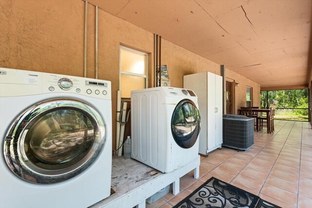 13719 Seminole Trl, Wimauma, FL 33598 - laundry area with light tile patterned floors