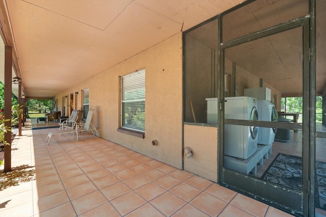 13719 Seminole Trl, Wimauma, FL 33598 - view of patio / terrace featuring washing machine and dryer