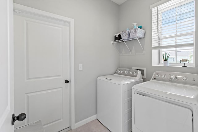 10962 High Noon Trl, Parrish, FL 34219 - laundry room featuring washing machine and clothes dryer and baseboards