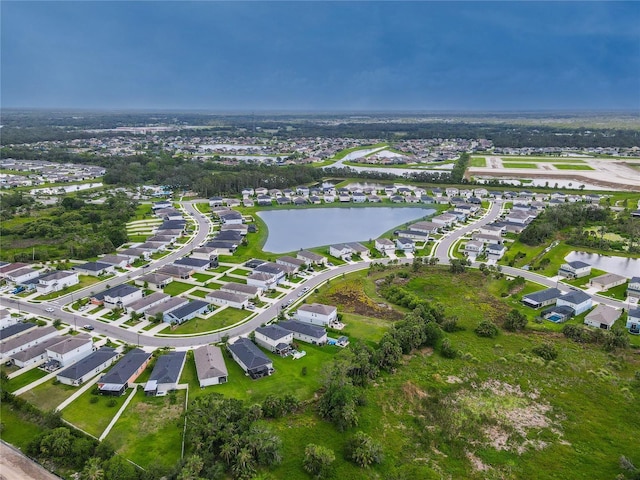 10962 High Noon Trl, Parrish, FL 34219 - aerial view of property and surrounding area featuring a nearby body of water and nearby suburban area