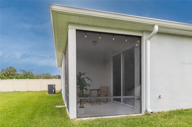 10962 High Noon Trl, Parrish, FL 34219 - back of house with cooling unit and stucco siding
