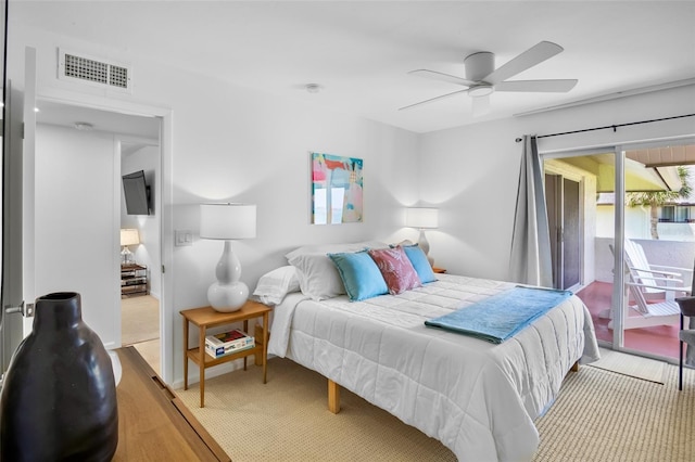 bedroom with access to outside and ceiling fan