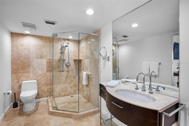 full bath with a shower stall, toilet, recessed lighting, and vanity