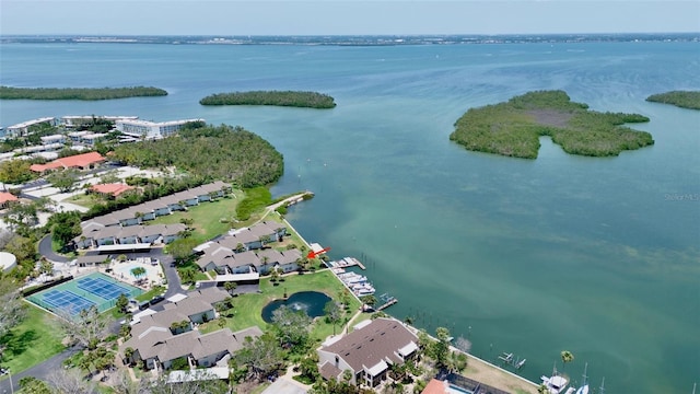 view of property location with a large body of water and nearby suburban area