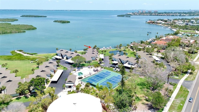 aerial perspective of suburban area featuring a nearby body of water