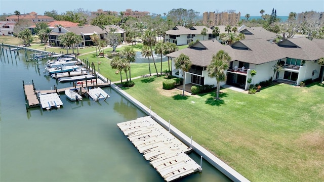 aerial perspective of suburban area featuring a nearby body of water