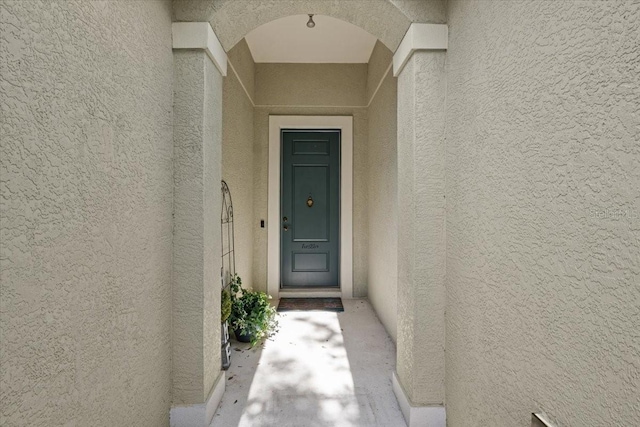4402 Natures Reach Ter, Parrish, FL 34219 - doorway to property featuring stucco siding