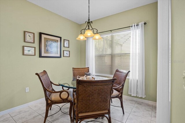 4402 Natures Reach Ter, Parrish, FL 34219 - dining space featuring light tile patterned floors and baseboards