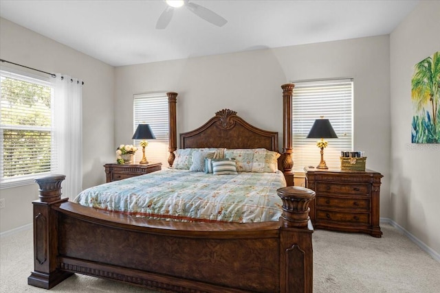 4402 Natures Reach Ter, Parrish, FL 34219 - carpeted bedroom featuring multiple windows, baseboards, and ceiling fan