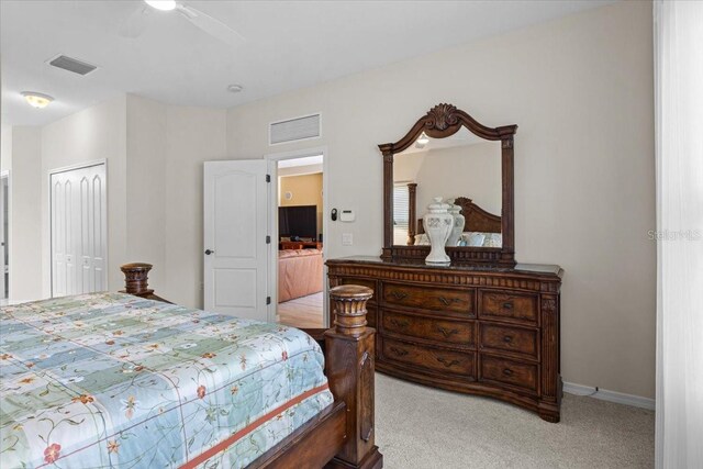 4402 Natures Reach Ter, Parrish, FL 34219 - bedroom featuring light carpet, a closet, and ceiling fan