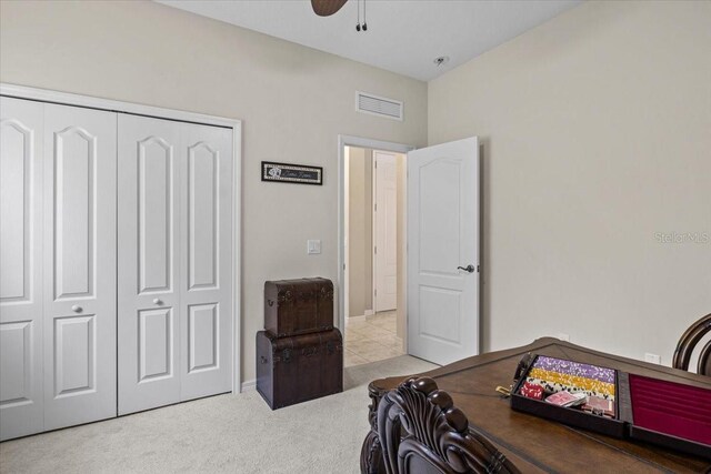 4402 Natures Reach Ter, Parrish, FL 34219 - carpeted bedroom with a closet, a ceiling fan, and baseboards