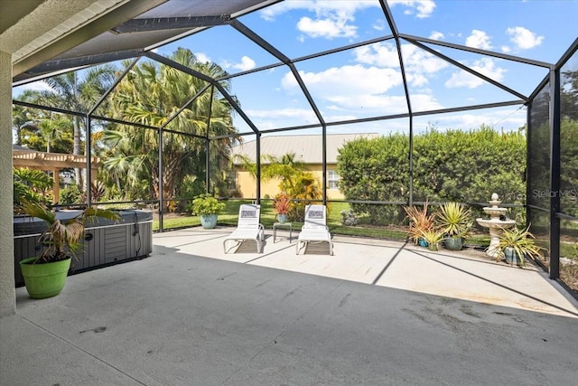 4402 Natures Reach Ter, Parrish, FL 34219 - view of patio / terrace with a hot tub and a lanai