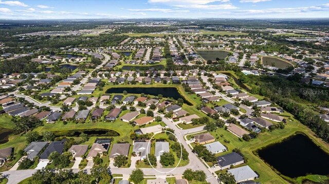 4402 Natures Reach Ter, Parrish, FL 34219 - aerial view of property and surrounding area featuring a nearby body of water and nearby suburban area