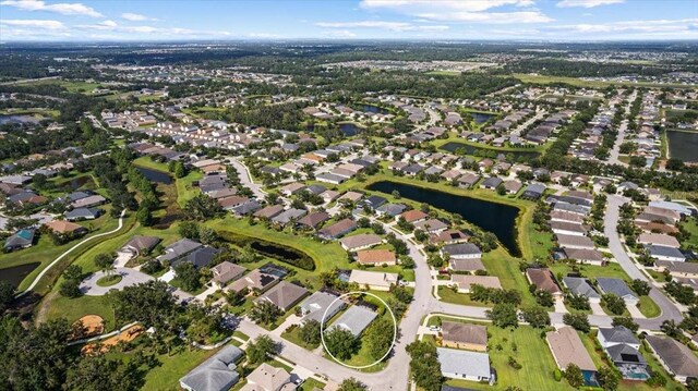 4402 Natures Reach Ter, Parrish, FL 34219 - aerial view of property's location featuring a large body of water and nearby suburban area