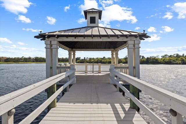 4402 Natures Reach Ter, Parrish, FL 34219 - dock featuring a gazebo and a water view