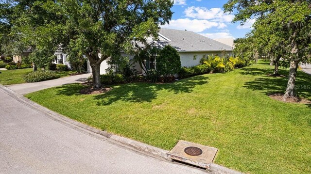 4402 Natures Reach Ter, Parrish, FL 34219 - view of front of house featuring a front lawn