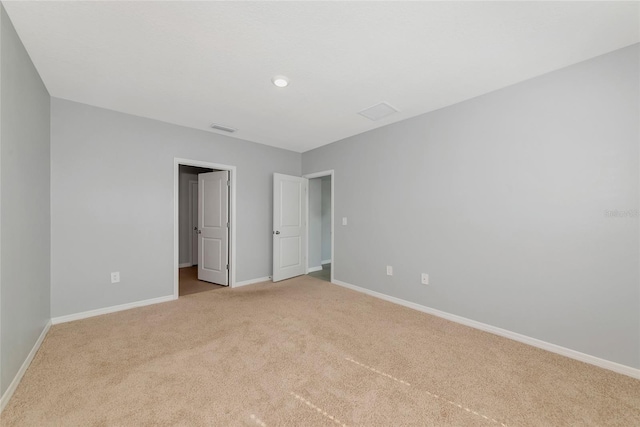 12712 Dusty Trail Dr, Sarasota, FL 34238 - unfurnished bedroom with light carpet and baseboards