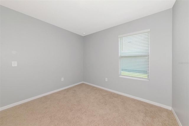 12712 Dusty Trail Dr, Sarasota, FL 34238 - empty room featuring light carpet and baseboards