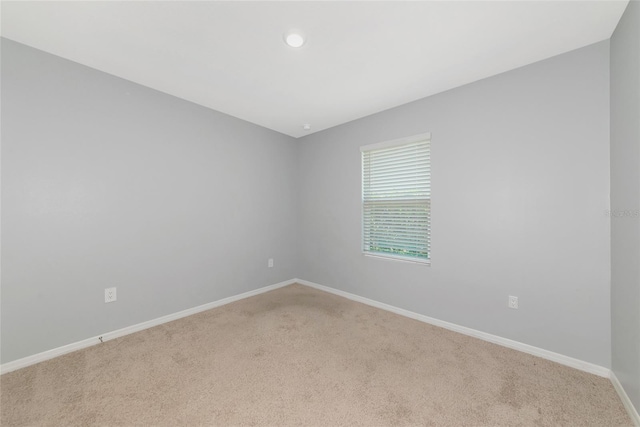 12712 Dusty Trail Dr, Sarasota, FL 34238 - empty room featuring carpet flooring, baseboards, and recessed lighting