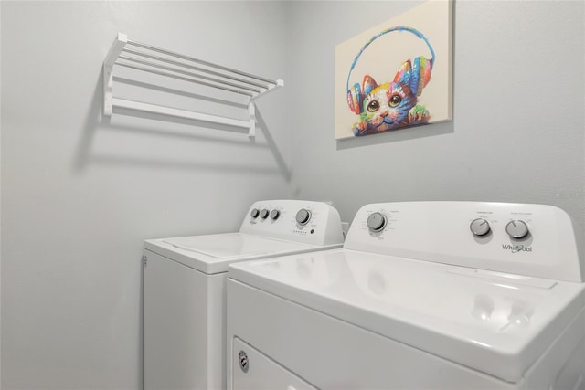 12712 Dusty Trail Dr, Sarasota, FL 34238 - laundry room featuring independent washer and dryer