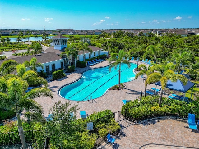 12712 Dusty Trail Dr, Sarasota, FL 34238 - community pool with a patio and a water view