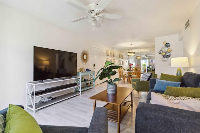 3269 Beneva Rd Unit 103, Sarasota, FL 34232 - living room featuring a ceiling fan and wood finished floors