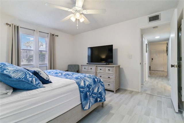 3269 Beneva Rd Unit 103, Sarasota, FL 34232 - bedroom featuring light wood-style floors, baseboards, and ceiling fan