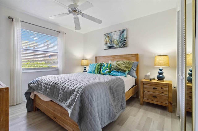 3269 Beneva Rd Unit 103, Sarasota, FL 34232 - bedroom featuring wood finished floors and a ceiling fan