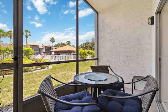 3269 Beneva Rd Unit 103, Sarasota, FL 34232 - sunroom with plenty of natural light and outdoor dining area