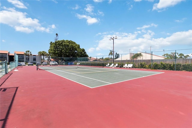 3269 Beneva Rd Unit 103, Sarasota, FL 34232 - view of tennis court with fence and community basketball court