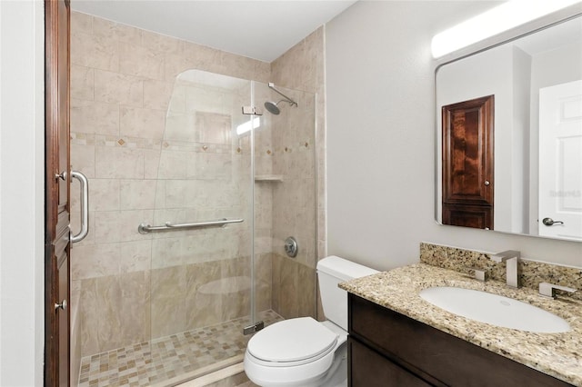 4037 Crockers Lake Blvd Unit 14, Sarasota, FL 34238 - bathroom featuring vanity and a shower stall