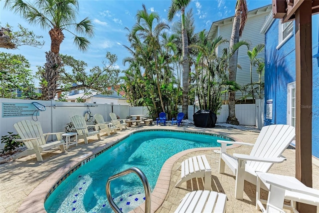 301 Highland Ave Unit 3, Bradenton Beach, FL 34217 - view of pool featuring a patio and a fenced backyard