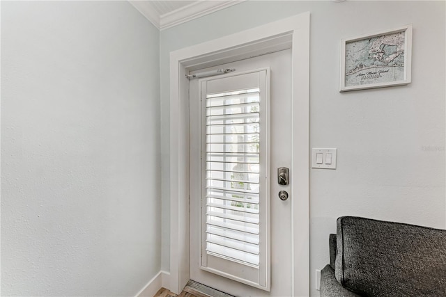 301 Highland Ave Unit 3, Bradenton Beach, FL 34217 - doorway to outside with ornamental molding and baseboards