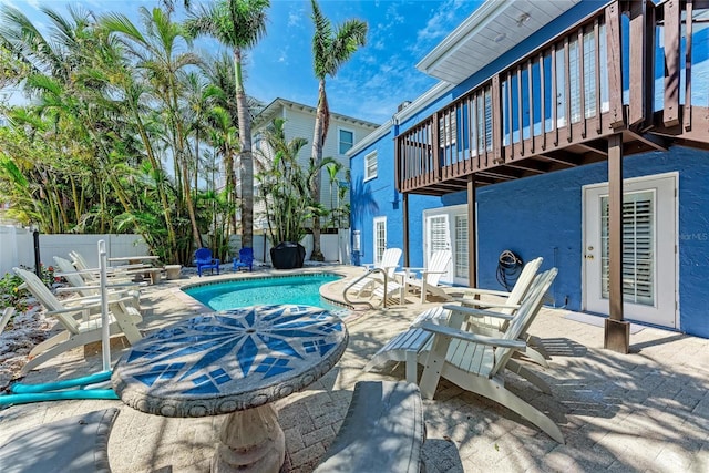 301 Highland Ave Unit 3, Bradenton Beach, FL 34217 - view of swimming pool with a fenced backyard, a patio area, and a deck