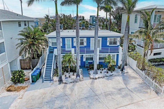 301 Highland Ave Unit 3, Bradenton Beach, FL 34217 - view of front facade with stairway and a balcony