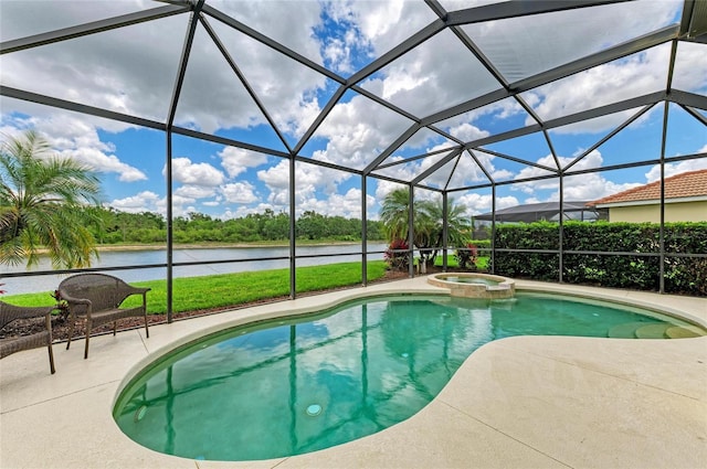 view of pool featuring a water view, a patio area, a pool with connected hot tub, and a lanai