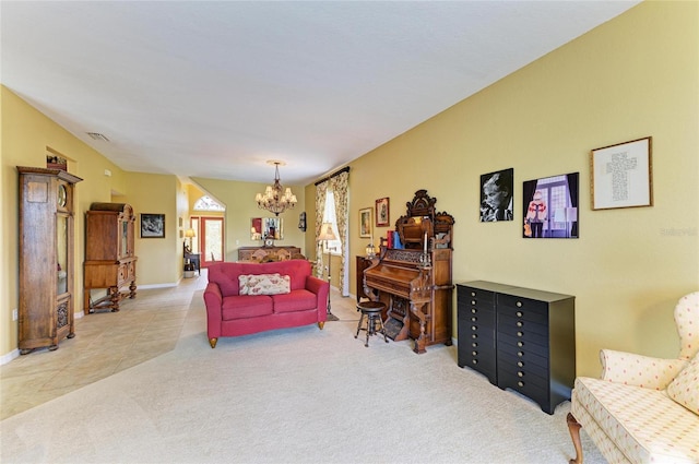 carpeted living area featuring a chandelier, tile patterned flooring, and baseboards