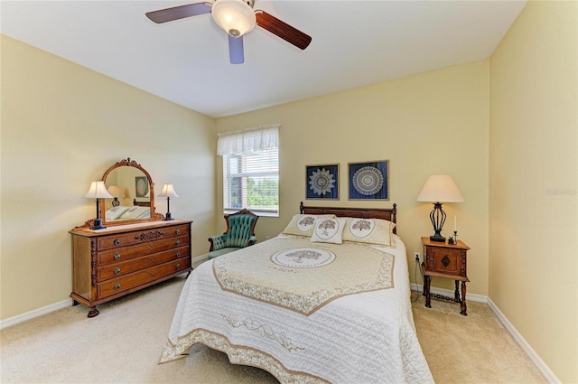 bedroom featuring carpet floors, baseboards, and ceiling fan