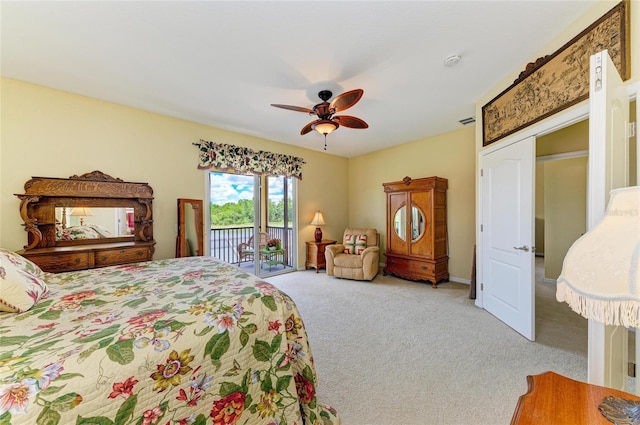 bedroom featuring access to outside, carpet, and a ceiling fan
