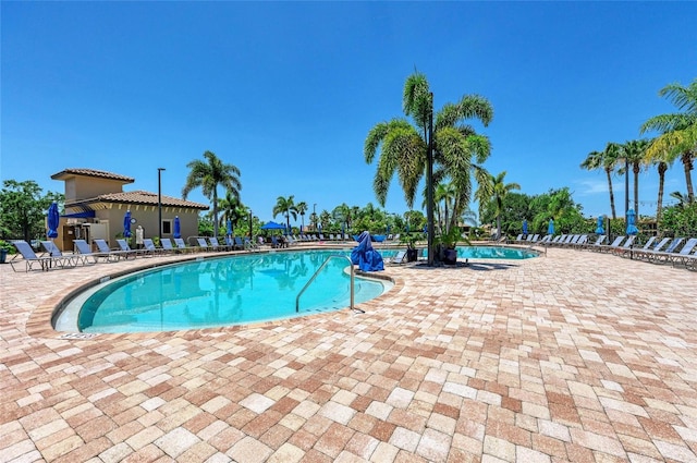 community pool with a patio