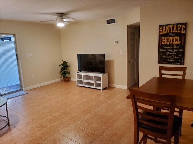 4607 W N B St Unit 105, Tampa, FL 33609 - dining room with a ceiling fan and light tile patterned floors