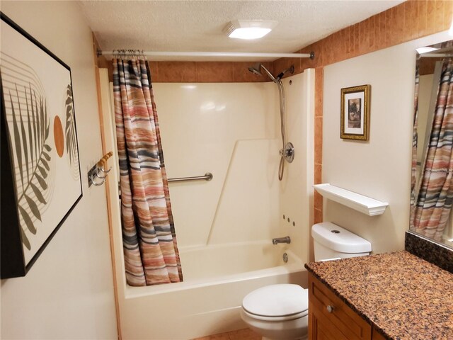 4607 W N B St Unit 105, Tampa, FL 33609 - bathroom with vanity, shower / bath combo with shower curtain, and a textured ceiling