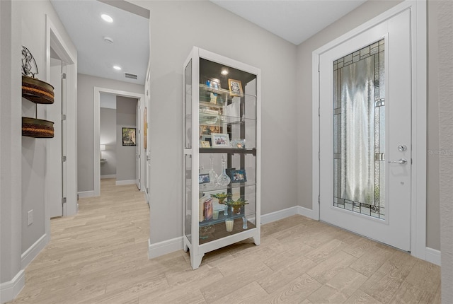6185 SW 89th Ct, Ocala, FL 34481 - foyer featuring light wood-style flooring, baseboards, and recessed lighting
