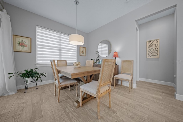 6185 SW 89th Ct, Ocala, FL 34481 - dining area with light wood-type flooring and baseboards