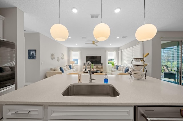 6185 SW 89th Ct, Ocala, FL 34481 - kitchen featuring a sink, open floor plan, ceiling fan, pendant lighting, and recessed lighting