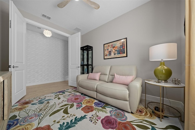 6185 SW 89th Ct, Ocala, FL 34481 - living area featuring wood finished floors, baseboards, and ceiling fan