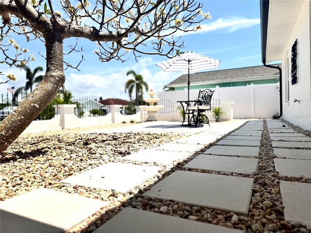 6524 Senegal Palm Way, Apollo Beach, FL 33572 - fenced backyard featuring a patio