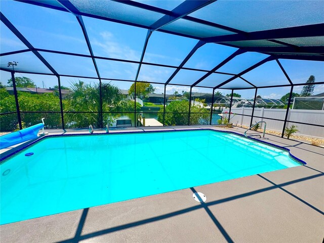 6524 Senegal Palm Way, Apollo Beach, FL 33572 - outdoor pool featuring a patio and a lanai
